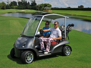 Click to see more of Garia Golf Buggy Garia Golf Buggy in grey on golf course by lake